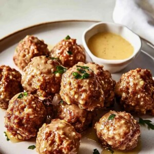 Sausage Balls with Lemon: The Ultimate Savory Appetizer Recipe 5 Mixing ingredients for Sausage Balls with Lemon in a bowl