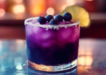 Blueberry Sriracha Margarita with fresh blueberries and spices
