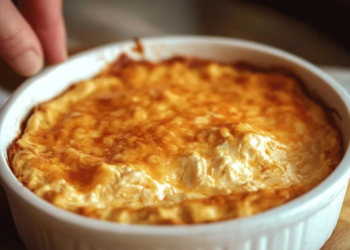 Delicious Buffalo Chicken Dip served in a bowl with tortilla chips.