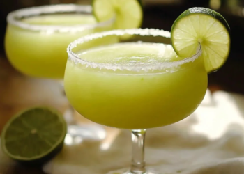 Refreshing Honeydew Lime Margaritas in a cocktail glass