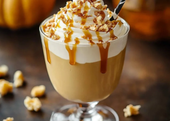 Delicious pumpkin milkshake topped with salted caramel drizzle