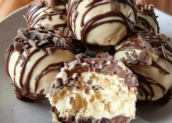 Baileys Tim Tam cheesecake balls ready to be served as a decadent dessert.