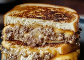 Delicious patty melt with secret sauce on a plate