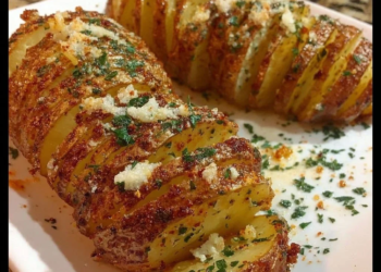 Crispy sliced baked potatoes seasoned and ready to enjoy